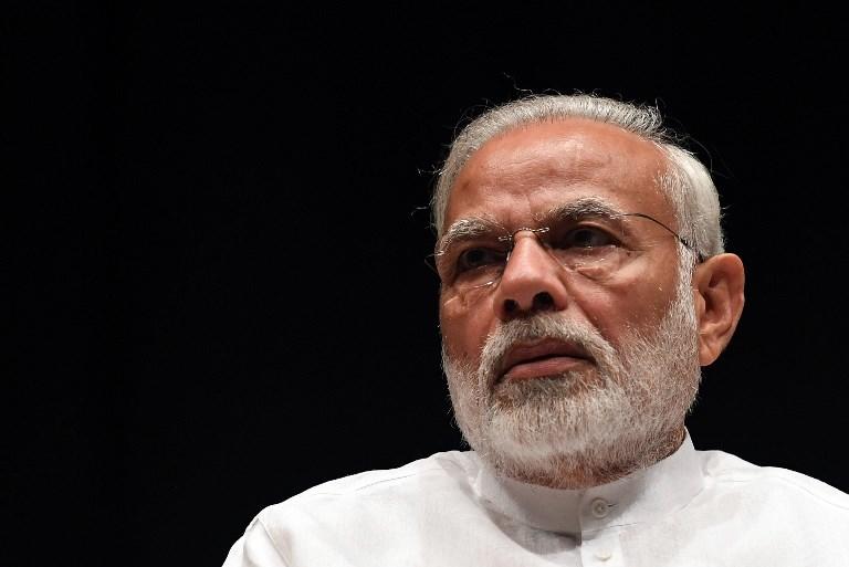 رئيس الوزراء الهندي ناريندار مودي خلال استماعه للبرمان في نيو دلهي. أ ف ب 