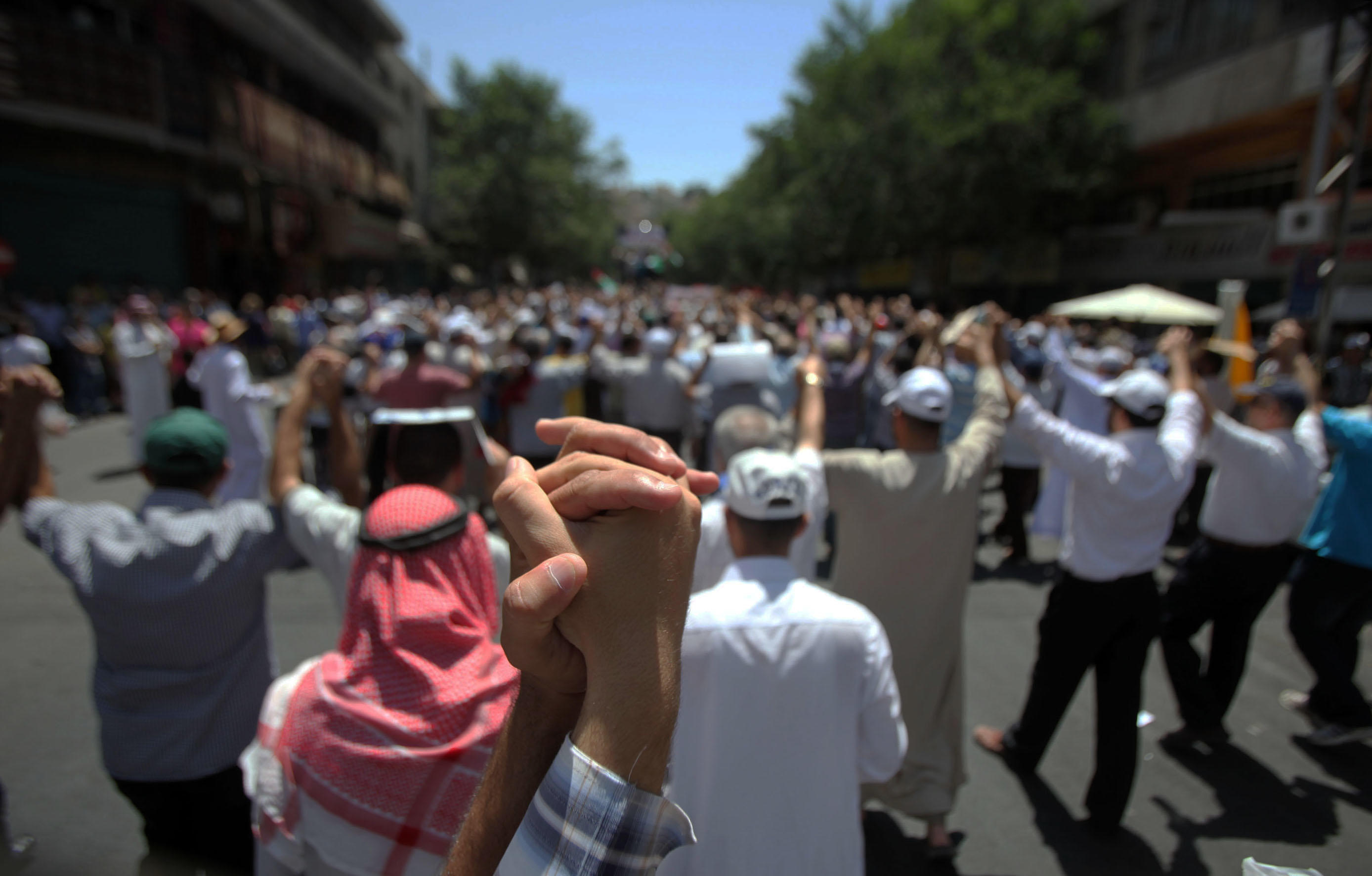 أردنيون في وسط العاصمة عمان يتظاهرون ضد التطرف والإرهاب، في عام 2013. صلاح ملكاوي/المملكة