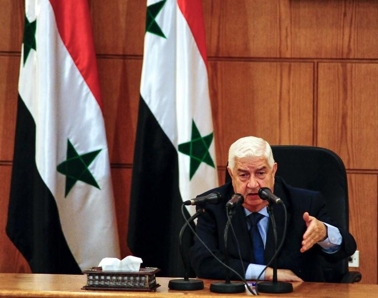 وزير خارجية سوريا وليد المعلم خلال مؤتمر صحفي في العاصمة دمشق 2 يونيو. أ ف ب 