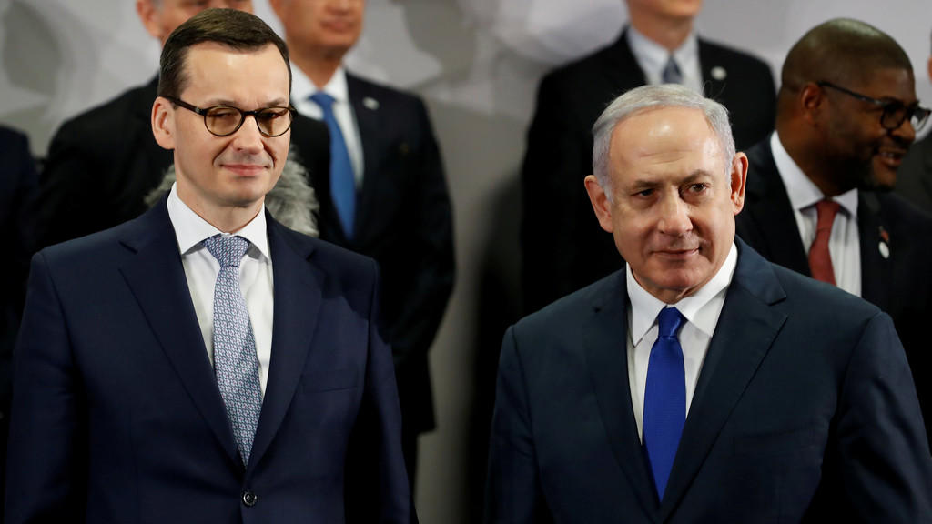 رئيس وزراء حكومة الاحتلال الإسرائيلي بنيامين نتنياهو ورئيس الوزراء البولندي ماتيوس مورافيسكي. 14 فبراير 2019. رويترز