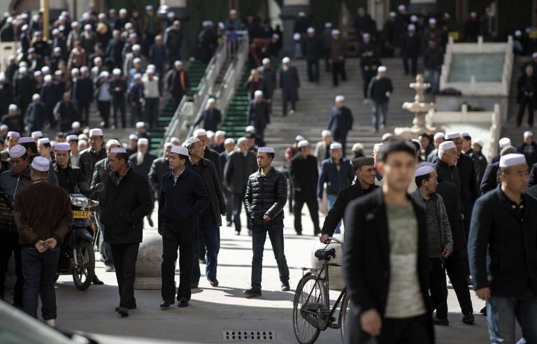 مسلمون في الصين بعد صلاة الجمعة بمقاطعة قانسو .  2 مارس 2018 .بيوهانس إيزيل / وكالة الصحافة الفرنسية