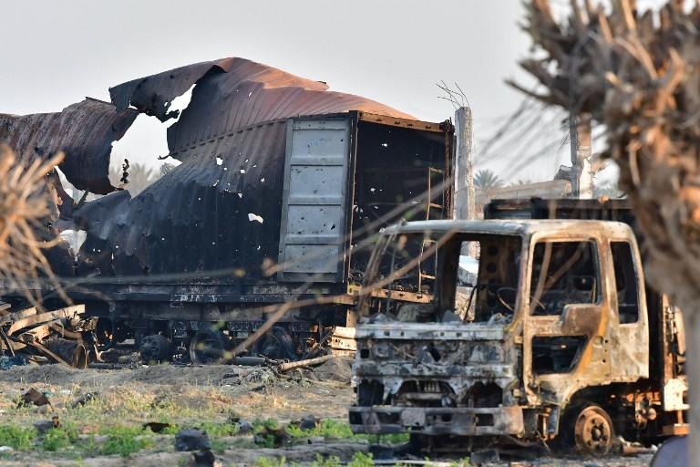 معسكر جرى ضربه بعد اشتباك بين قوات سوريا الديمقراطية مع (داعش) بالقرب من قرية الباغوز في محافظة دير الزور شرق سوريا . 15 مارس 2019. أ ف ب 
