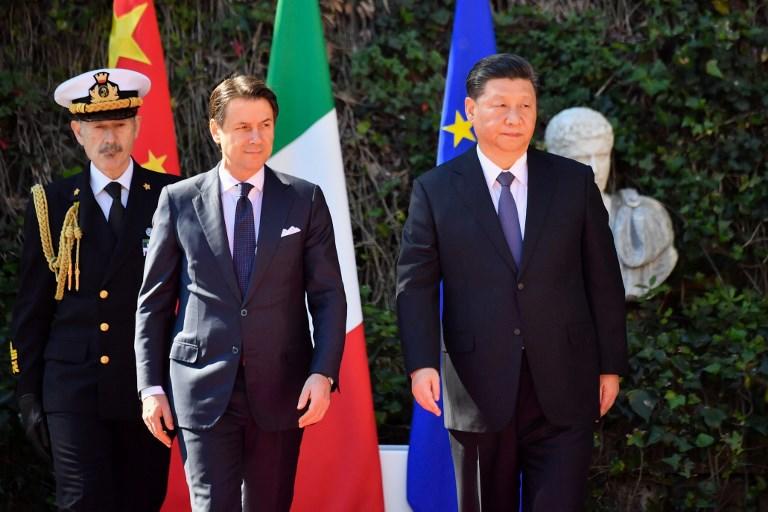 الرئيس الصيني مع رئيس الوزراء الإيطالي قبيل توقيع اتفاقيات الشراكة، 23 مارس 2019. البرتو بيزولي/ أ ف ب