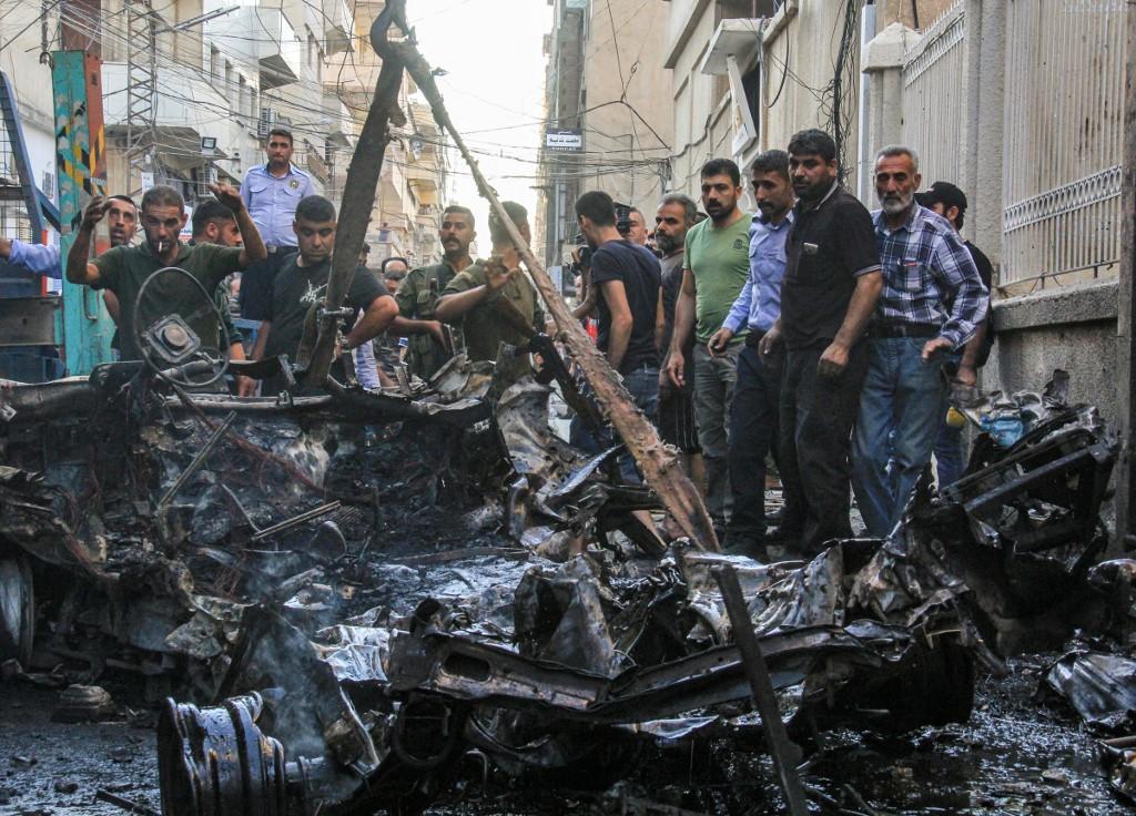حطام سيارة انفجرت خارج  كنيسة في مدينة القامشلي شمال شرق سوريا. 11 يوليو 2019. محمد أحمد / أ ف ب