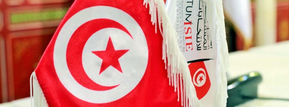 راية تحمل شعار هيئة الانتخابات والعلم التونسي. (صفحة هيئة الانتخابات في تونس)