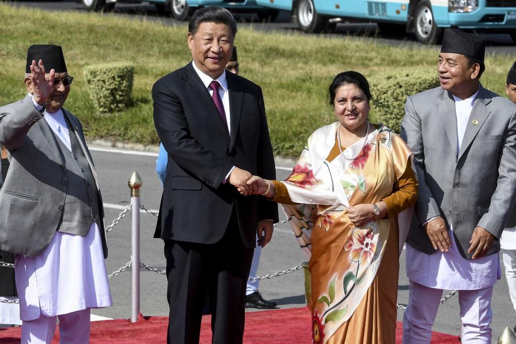 رئيسة نيبال والرئيس الصيني شي جينبينغ.13 أكتوبر 2019.براكاش ماثيما / أ ف ب