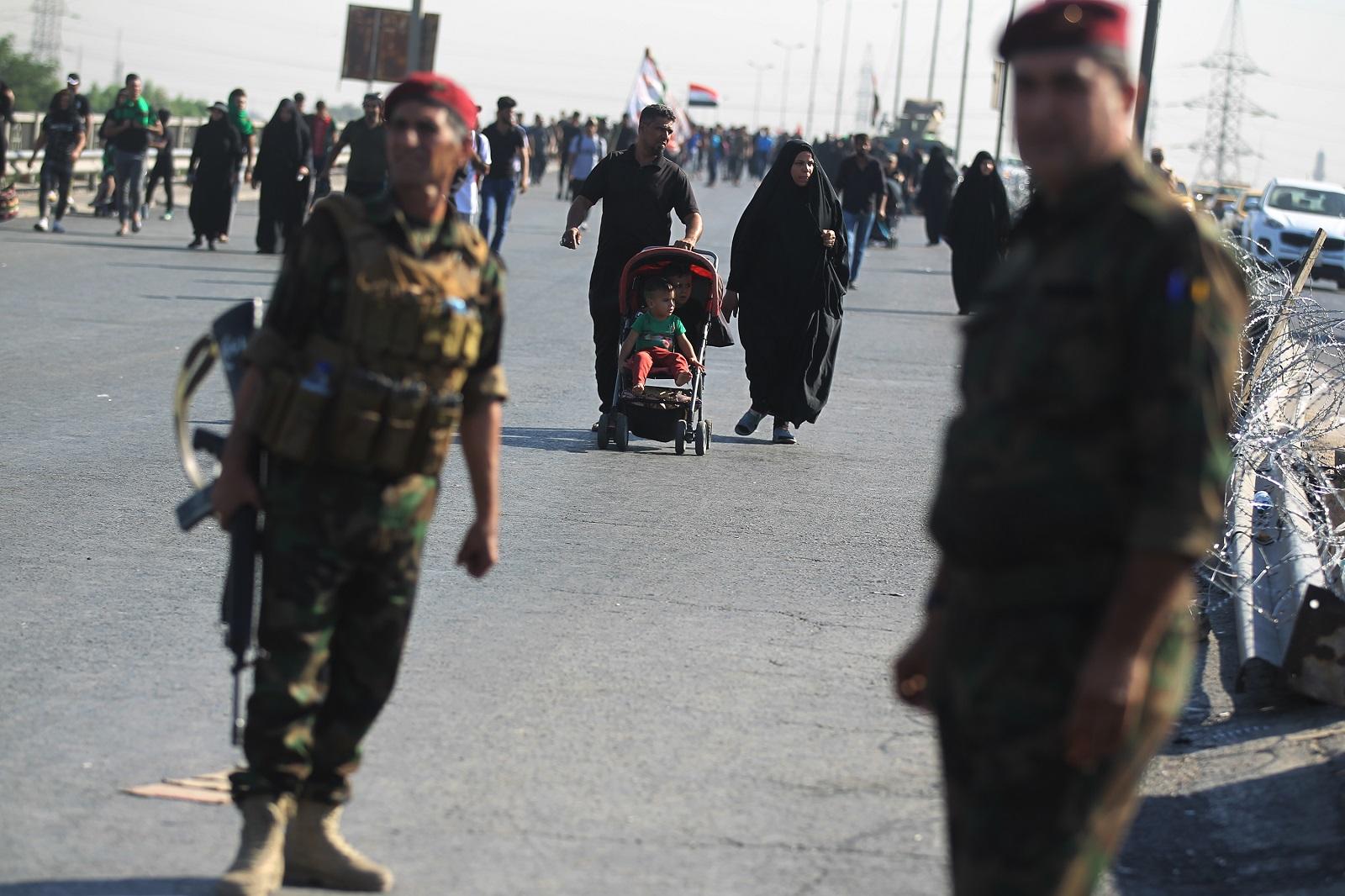 أفراد قوات الأمن العراقية في كربلاء. 15 أكتوبر 2019. (أ ف ب)