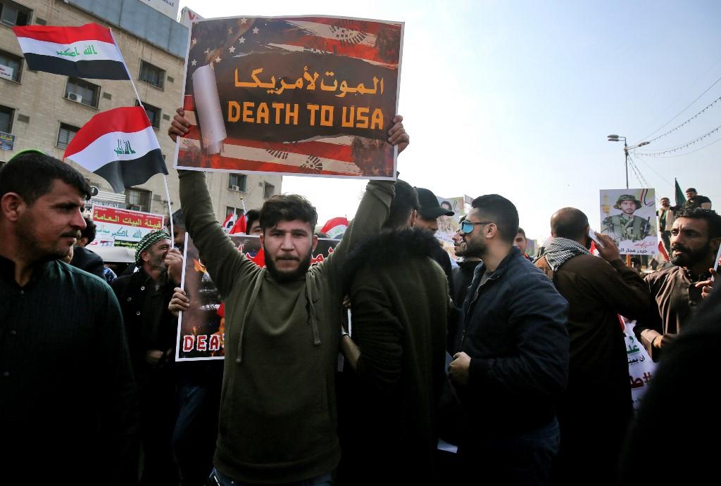 متظاهرون في ميدان التحرير بالعاصمة بغداد في 5 ديسمبر 2019. أحمد الربيعي / أ ف ب