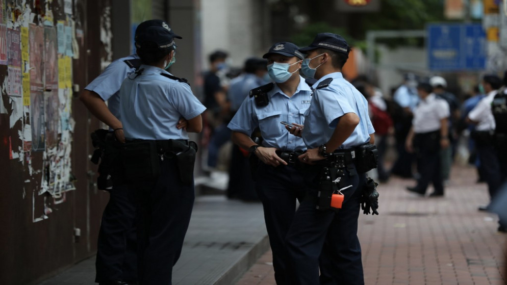 تقوم الشرطة بدوريات لردع المظاهرات خلال العيد الوطني للصين في هونغ كونغ، 1 أكتوبر 2020. (أ ف ب)