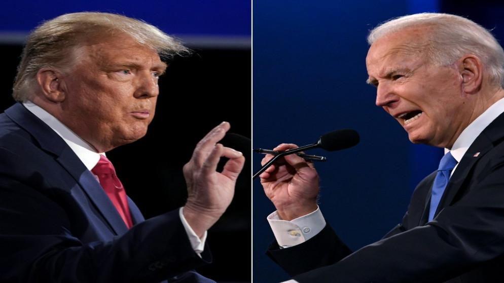 المرشح الرئاسي الديمقراطي جو بايدن (يمين)، والرئيس الأميركي دونالد ترامب خلال مناظرة تلفزيونية. (أ ف ب)