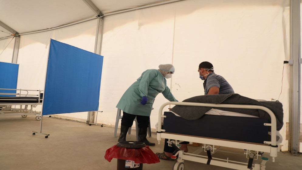 مجد أسامة، 23 سنة من سوريا. مجد يتلقى الرعاية الطبية في مركز علاج كوفيد-19 التابع لمنظمة أطباء بلا حدود في مخيم الزعتري للاجئين السوريين. 21/10/2020. (محمد سنباني/ أطباء بلا حدود)
