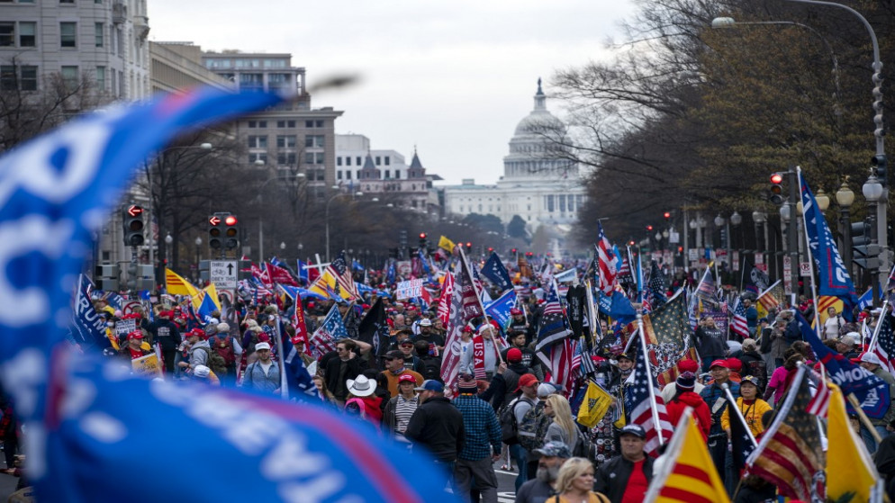يشارك أنصار الرئيس الأميركي دونالد ترامب في مسيرة Million MAGA للاحتجاج على نتائج الانتخابات الرئاسية لعام 2020، واشنطن العاصمة، في 12 كانون الأول/ ديسمبر 2020. (أ ف ب)