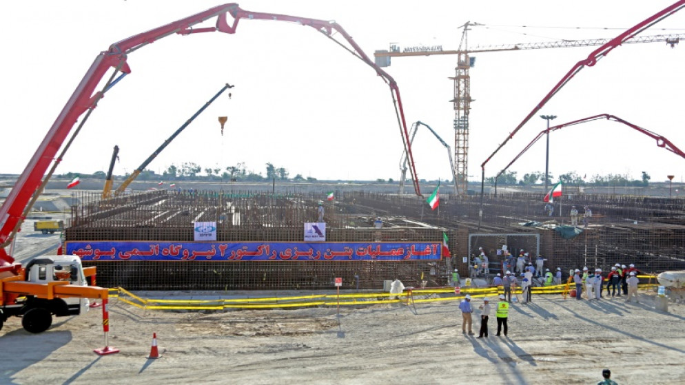 عمال يشاركون في أعمال بناء مفاعل في محطة بوشهر الكهربائية التي تعمل بالطاقة النووية في ايران، 10 تشرين الثاني/نوفمبر 2019. (أ ف ب)