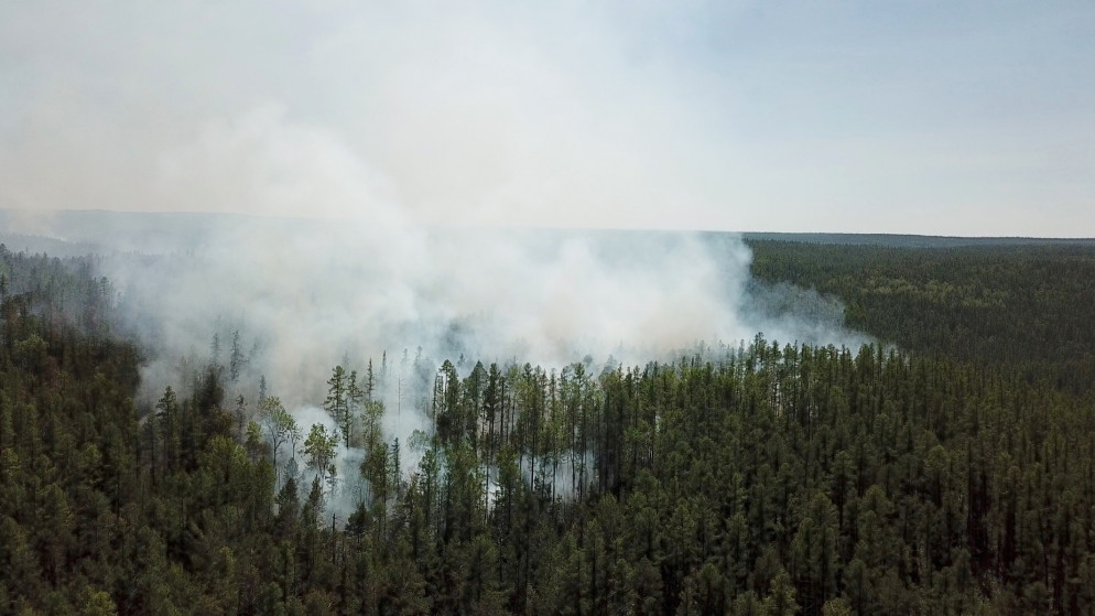 دخان متصاعد من حريق غابات في منطقة كراسنويارسك في سيبيريا في روسيا، 10 تموز/يوليو 2020. (رويترز)