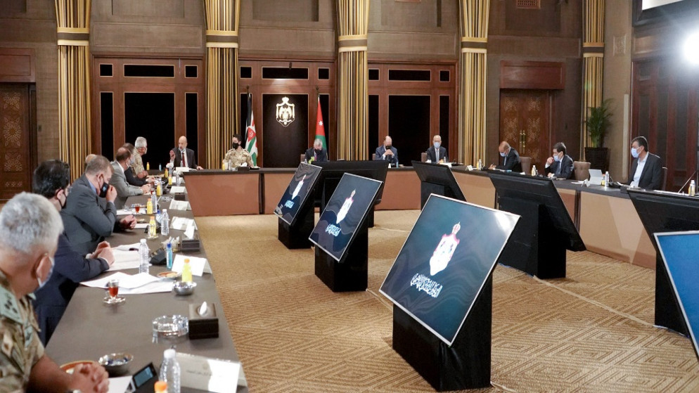 جلالة الملك عبدالله الثاني خلال ترؤسه اجتماعاً لمجلس السياسات الوطني . (الديوان الملكي الهاشمي)