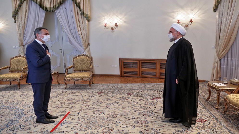 الرئيس حسن روحاني (يمين) يستقبل وزير الخارجية السويسري قبل اجتماع في العاصمة طهران. 7 سبتمبر 2020. الرئاسة الإيرانية