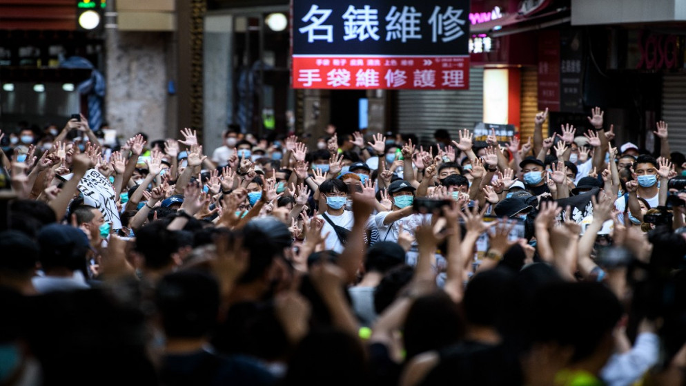 متظاهرون مسيرة ضد قانون الأمن القومي الجديد في هونغ كونغ .1 يوليو 2020.(أ ف ب)