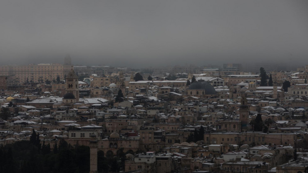 المدينة المقدسة تكتسي بالثلج في القدس المحتلة. 18/02/2021. (عفيف عميرة/ وفا)