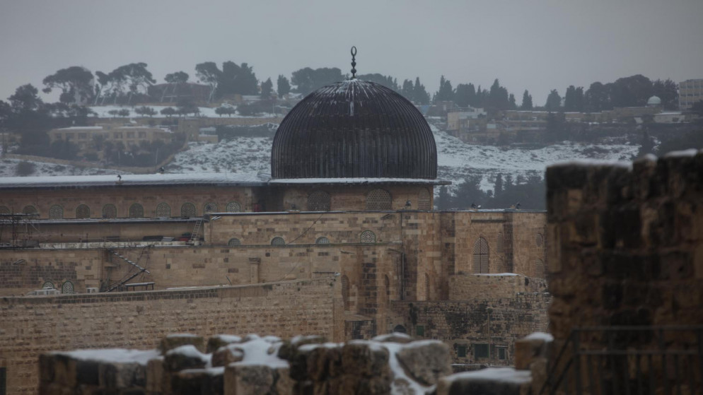 المدينة المقدسة تكتسي بالثلج في القدس المحتلة. 18/02/2021. (عفيف عميرة/ وفا)