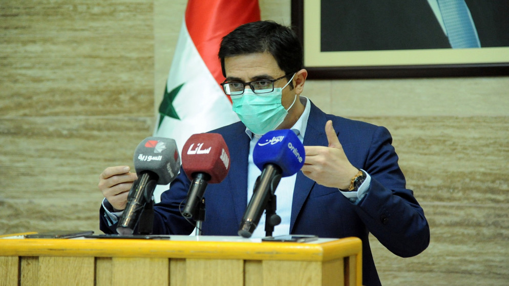 وزير الصحة السوري حسن غباش يتحدث خلال مؤتمر صحفي في دمشق ، سوريا 25 فبراير 2021. (سانا/رويترز)