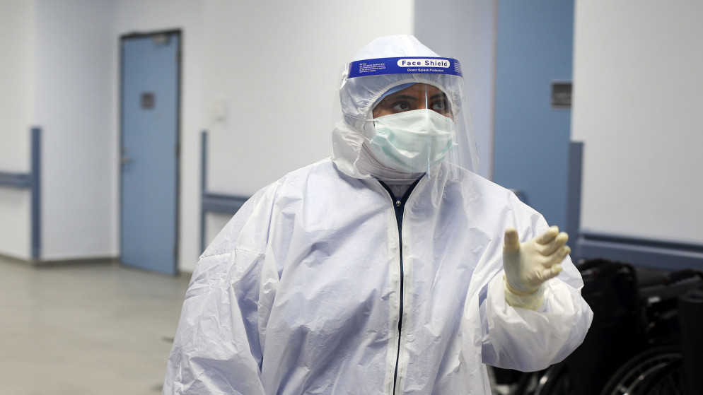 طبيبة ترتدي كمامات واقية من فيروس كورونا في مستشفى البشير. (صلاح ملكاوي/ المملكة)