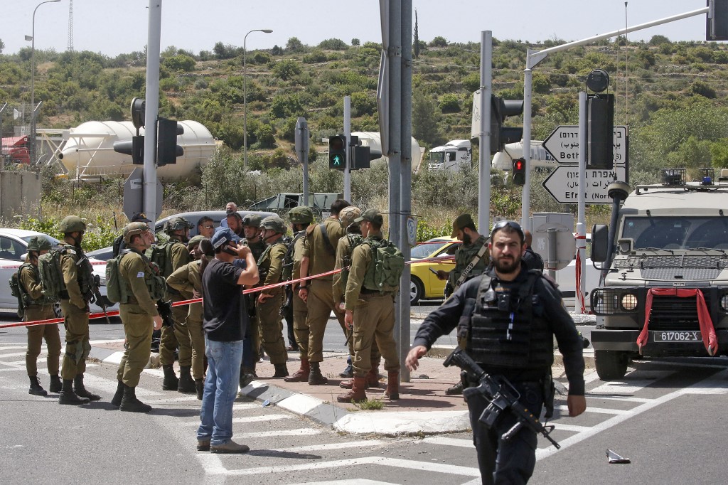 تجمع لقوات الاحتلال الإسرائيلي قرب مستوطنة في الضفة الغربية المحتلة. (أ ف ب)