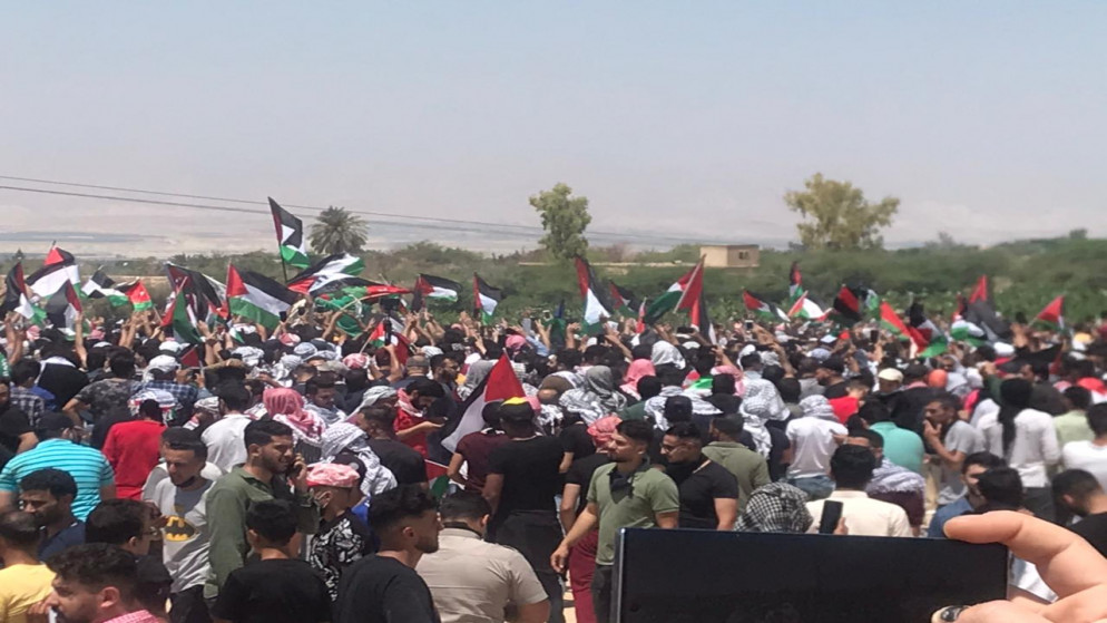 وقفة لأردنيين في منطقة الشونة الجنوبية منددين بالعدوان الإسرائيلي على قطاع غزة. (المملكة)