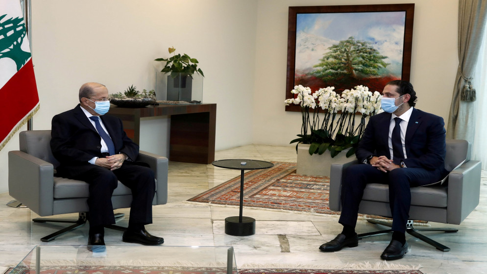 رئيس الوزراء المكلف سعد الحريري (يمين) والرئيس اللبناني ميشال عون. (رويترز)
