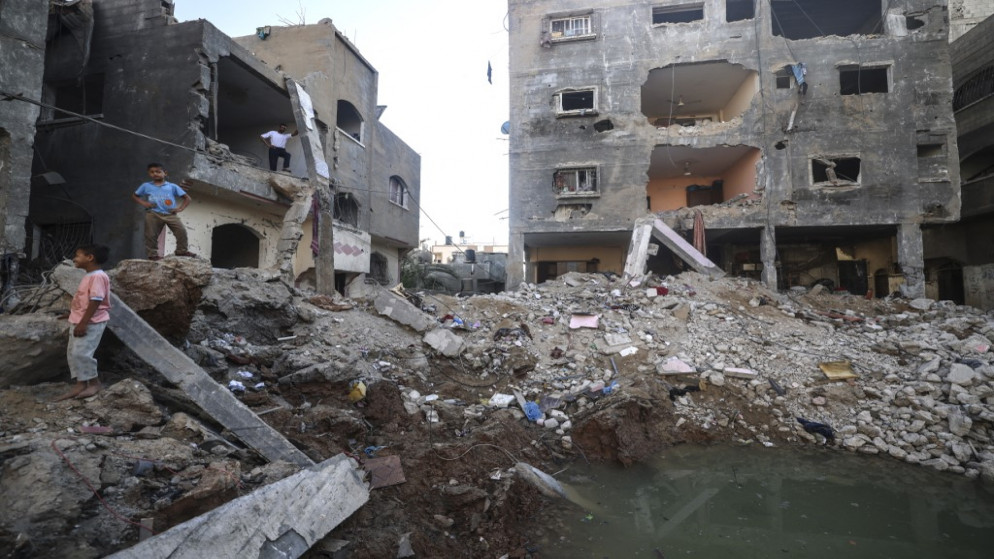 مبانٍ مدمرة بعد عدوان إسرائيلي على قطاع غزة استمر 11 يوما. (أ ف ب)