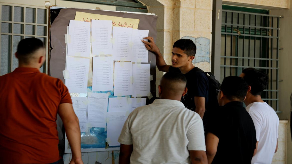طلبة ثانوية عامة يتقدمون للامتحانات النهائية في أريحا. 24/06/2021. (سليمان أبو سرور/وفا)