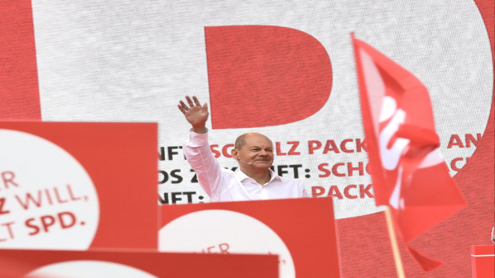 زعيم الحزب الاشتراكي الديمقراطي أولاف شولتز في كولونيا غرب ألمانيا. (أ ف ب)