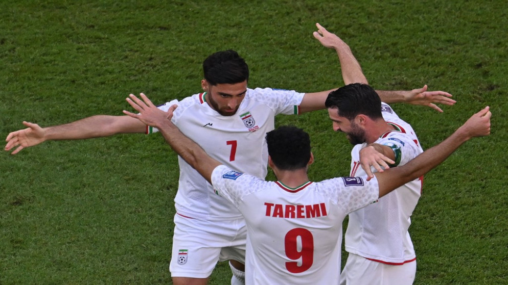 لاعبو إيران يحتفلون بعد فوزهم على ويلز .قطر. 25 نوفمبر 2022.(أ ف ب)