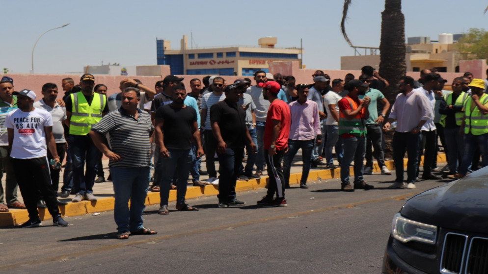 وقفة احتجاجية لموظفي موانئ العقبة للمطالبة بتوفير إجراءات السلامة في أماكن العمل. 29/06/2022. (نزار الصرايرة/المملكة)