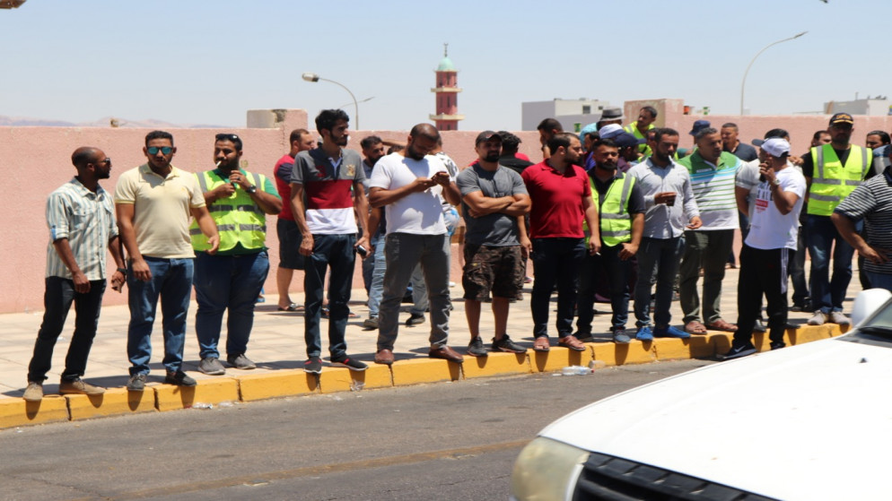وقفة احتجاجية لموظفي موانئ العقبة للمطالبة بتوفير إجراءات السلامة في أماكن العمل. 29/06/2022. (نزار الصرايرة/المملكة)