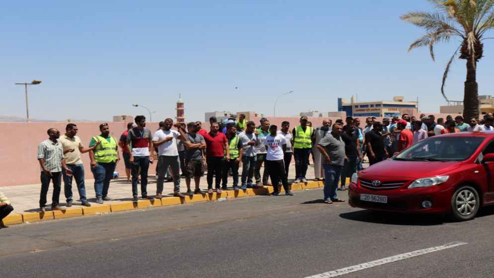 وقفة احتجاجية لموظفي موانئ العقبة للمطالبة بتوفير إجراءات السلامة في أماكن العمل. 29/06/2022. (نزار الصرايرة/المملكة)