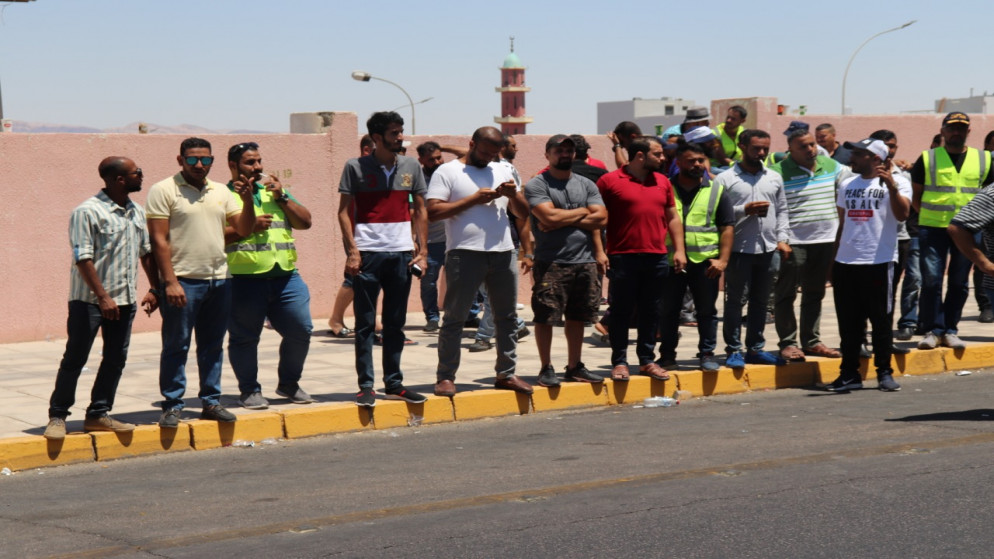وقفة احتجاجية لموظفي موانئ العقبة للمطالبة بتوفير إجراءات السلامة في أماكن العمل. 29/06/2022. (نزار الصرايرة/المملكة)