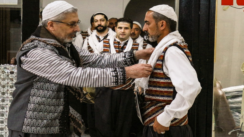 معتز بولاد (يسار)، زعيم "باب الحارة". 24 حزيران/يونيو 2022 (أ ف ب)