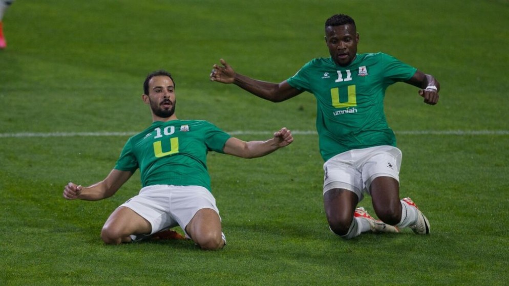 صالح راتب صاحب هدفي الوحدات في مرمى الاتحاد الأهلي حلب السوري ضمن منافسات كأس الاتحاد الآسيوي لكرة القدم. (الاتحاد الآسيوي)