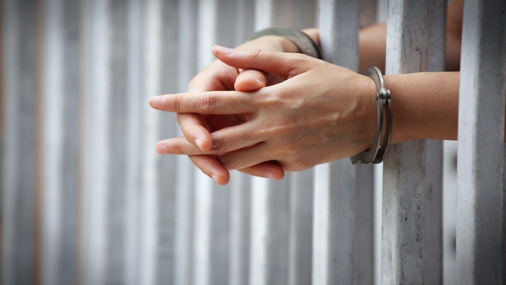 صورة توضيحية لشخص في سجن. (Shutterstock)