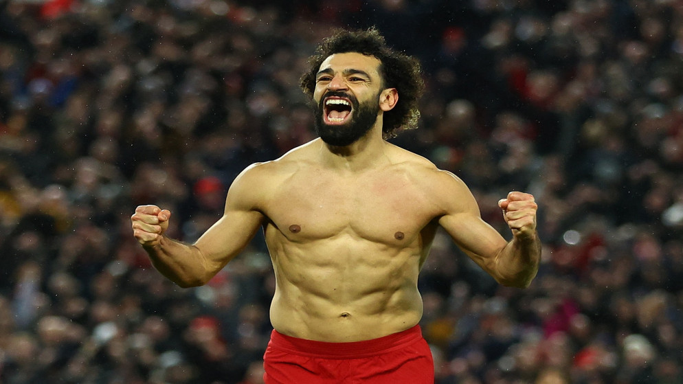 المصري محمد صلاح لاعب ليفربول يحتفل بتسجيل الهدف السادس لفريقه في مرمى مانشستر يونايتد، 5 آذار/مارس 2023. (أ ف ب)