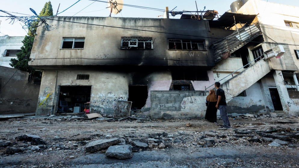 مبنى مدمر بعد انسحاب جيش الاحتلال الإسرائيلي من مخيم جنين في الضفة الغربية المحتلة، 5 تموز 2023. (رويترز)