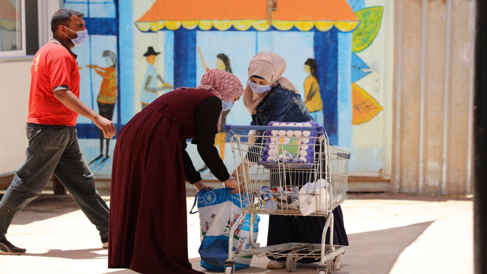 برنامج الأغذية العالمي في الأردن أكد أن نقص التمويل "الحاد وغير المسبوق" أجبره على تقليص مساعداته الغذائية الشهرية لقرابة 465,000 لاجئ. (محمد بطاح/ برنامج الأغذية العالمي)