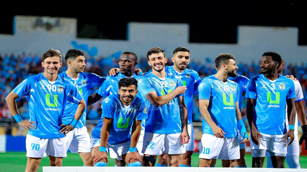 لاعبون في النادي الفيصلي لكرة القدم.