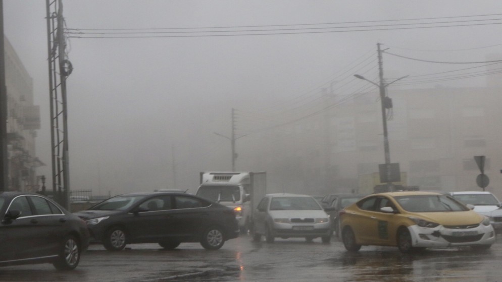 صورة أرشيفية لأمطار في العاصمة عمّان. (صلاح ملكاوي / المملكة)
