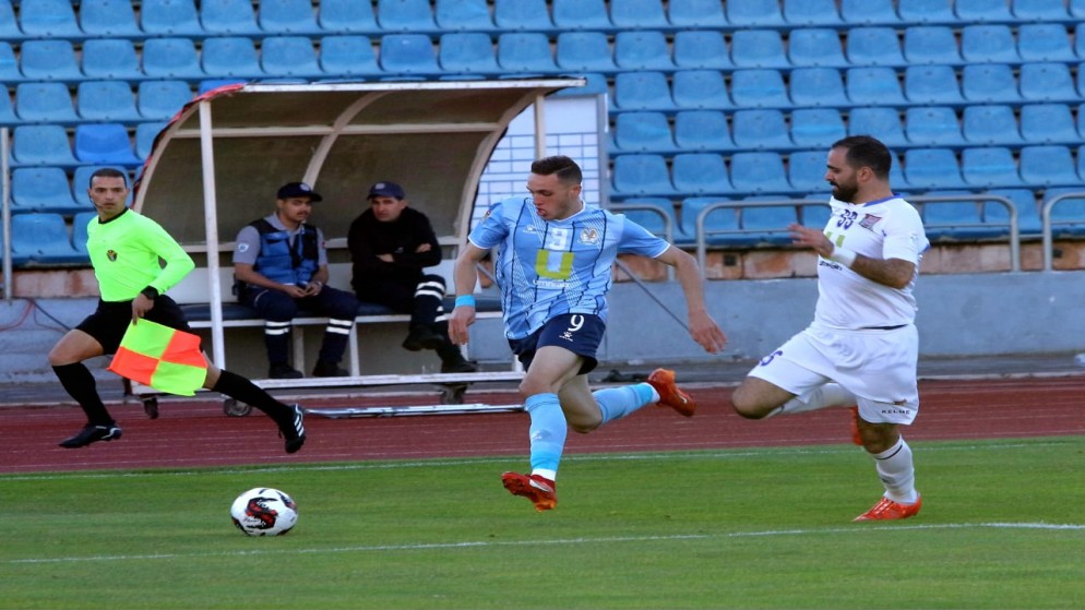 جانب من مباراة سحاب مع الفيصلي في دور ثمن النهائي من بطولة كأس الأردن لكرة القدم. (بترا)