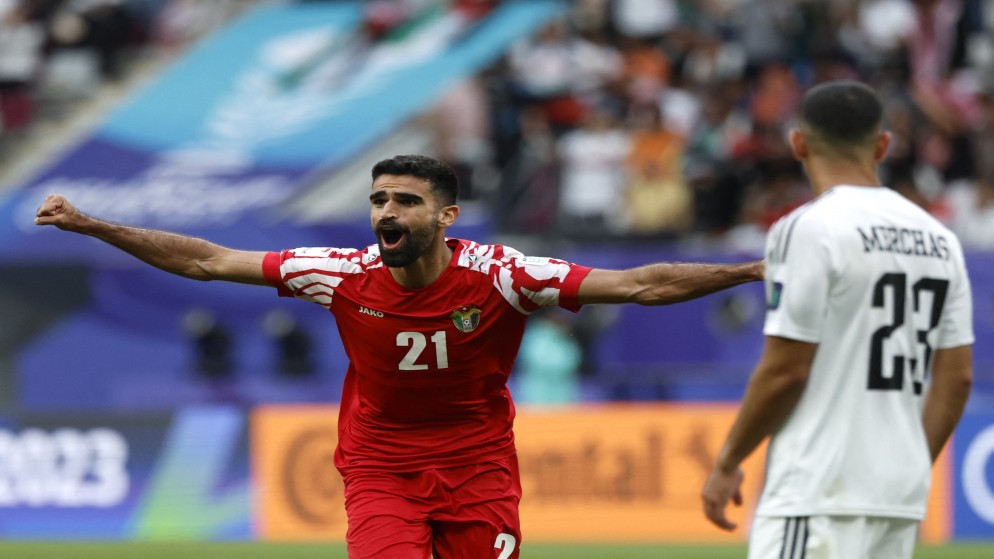 اللاعب نزار الرشدان بعد تسجيله للهدف الحاسم في الشباك العراقية في ثمن نهائي كأس آسيا 2023. (رويترز)