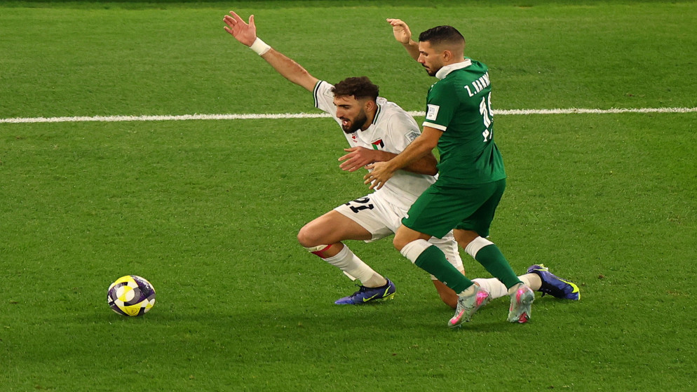 صورة من مباراة فلسطين وسوريا (رويترز)