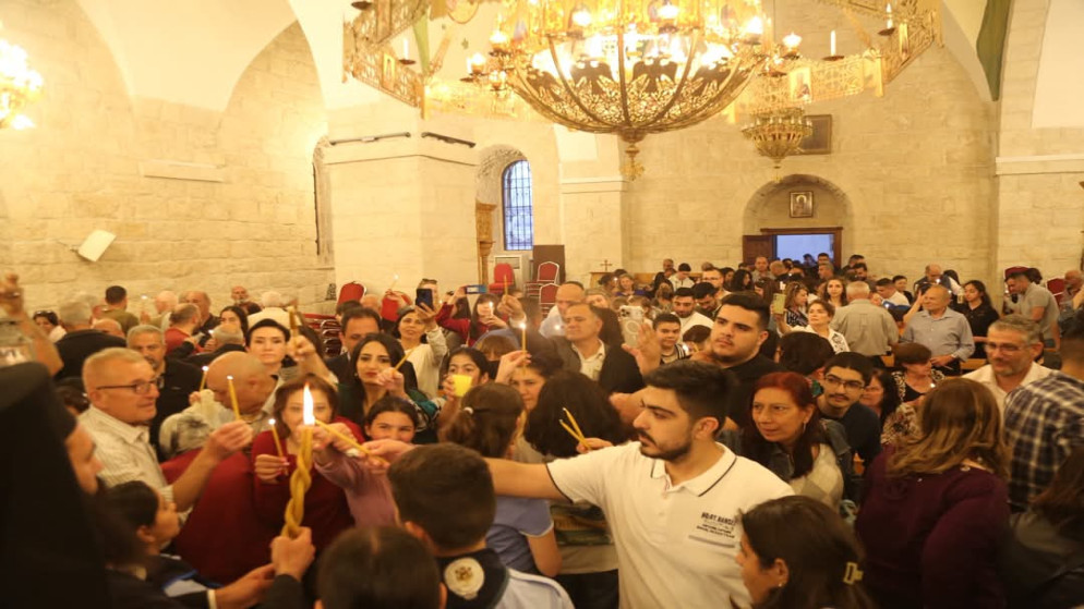 احتفالات مسيحيو الأردن بعيد الفصح المجيد في كنيسة القديس جيورجيوس الروم الأرثوذكس الحصنفي إربد.