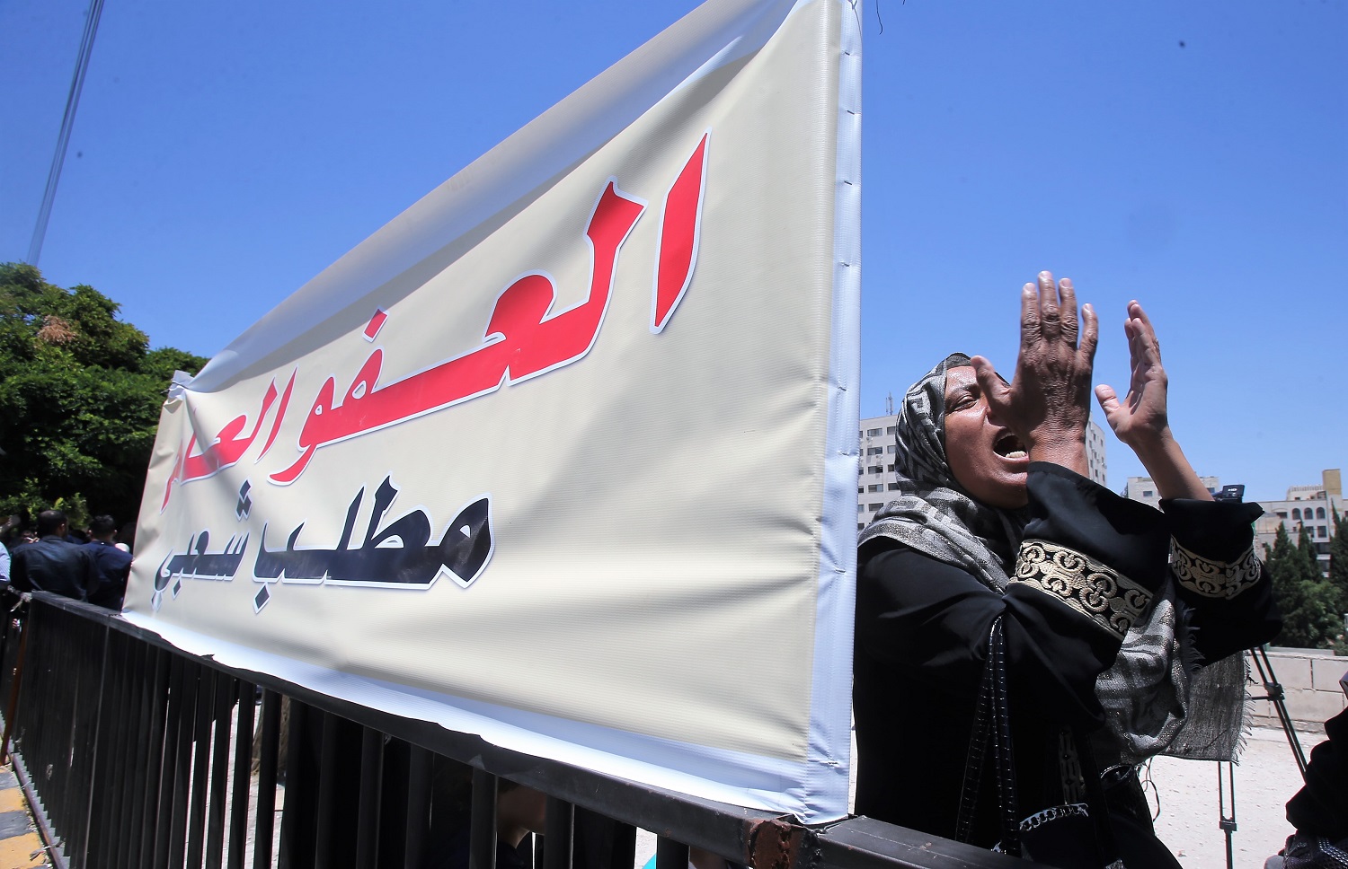 سيدة شاركت في اعتصام للمطالبة بعفو عام أمام مجلس النواب في 15 يوليو 2018. صلاح ملكاوي/ المملكة     