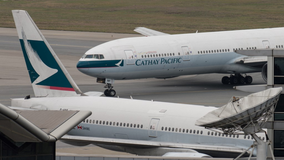 طائرات تابعة لشركة "كاثي باسيفيك" في مطار هونغ كونغ الدولي. (أ ف ب)